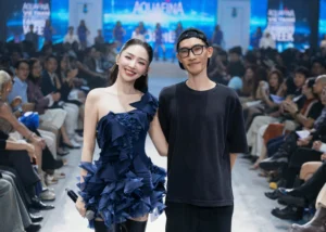 2. Ca sĩ Tóc Tiên và NTK Tom Trandt trong show diễn của thương hiệu Môi Điên tại đêm khai mạc Aquafian Tuần lễ Thời trang Quốc tế Việt Nam 2026